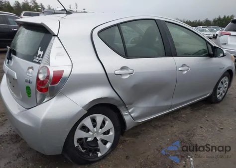 2014 Toyota Prius C One z USA, uszkodzony, nr VIN JTDKDTB35E1075509